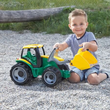 Traktor z žlico zeleno rumeno